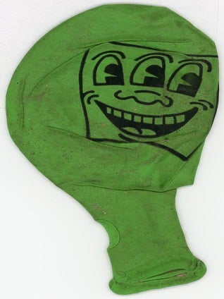 Item #SKB-17324 A balloon printing Haring's three-eyed smiling face image. Keith HARING