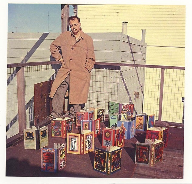 Item #SKB-17492 Terrific color photograph (recent print) of Kenneth Patchen and his painted books. Kenneth PATCHEN.
