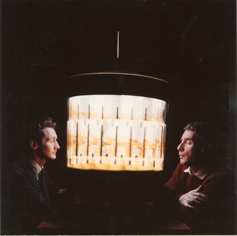 Item #SKB-3959 Color photograph (recent print) of Brion Gysin and Ian Sommerville staring into a dream machine. Brion GYSIN, Herman LEONARD.
